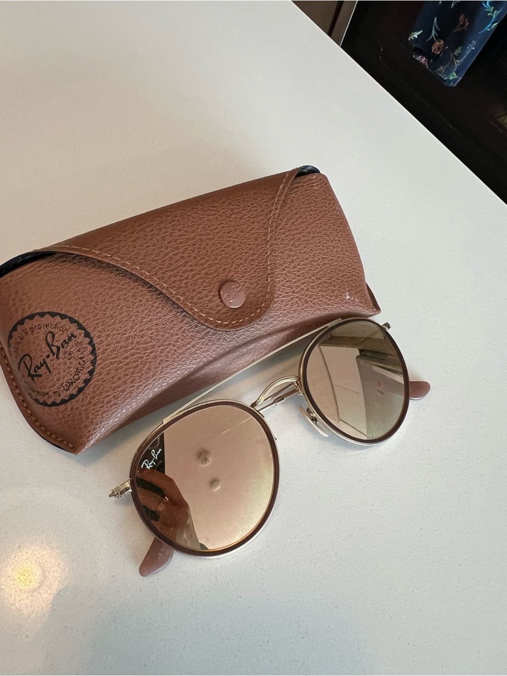 Ray-Ban women’s Round Metal Sunglasses in Brown
